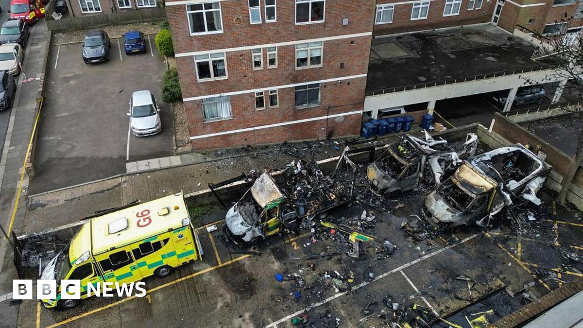 An aerial image showing burnt out ambulances in a parking area in Golders Green. 
