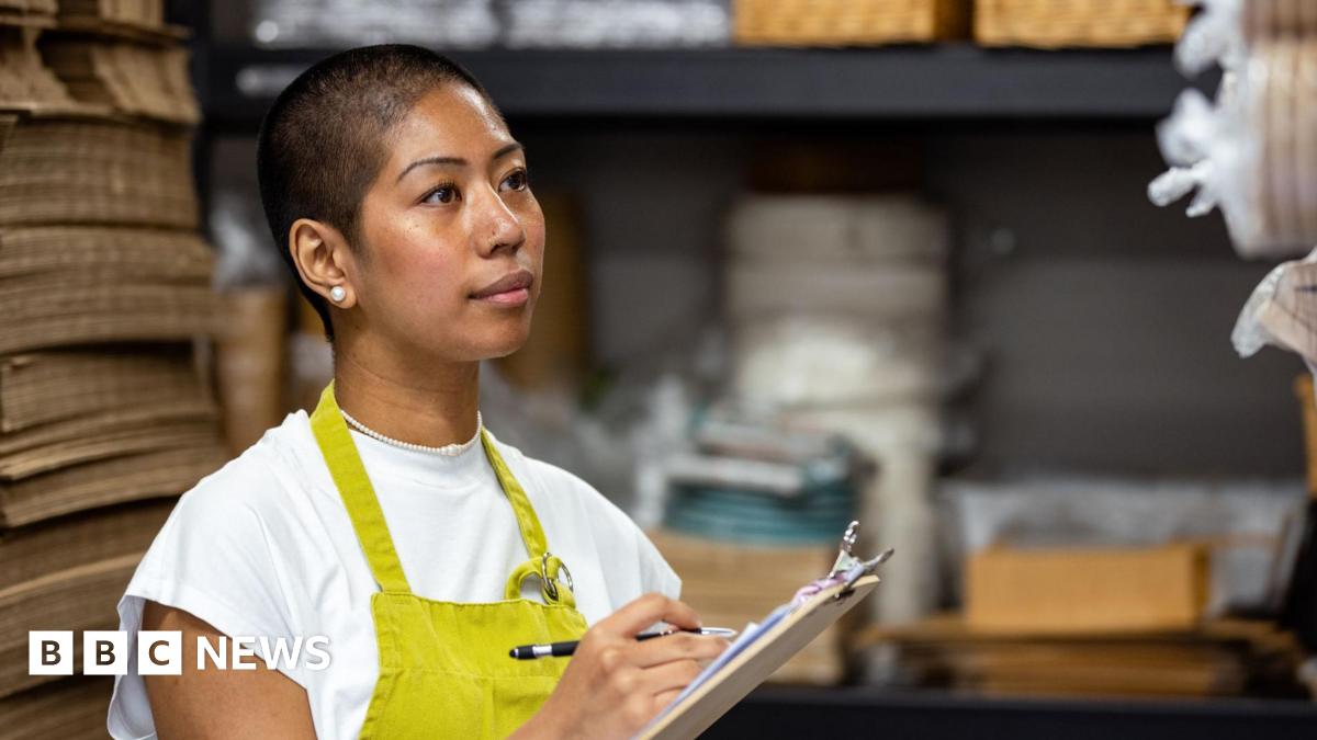Woman working in a store cupboard