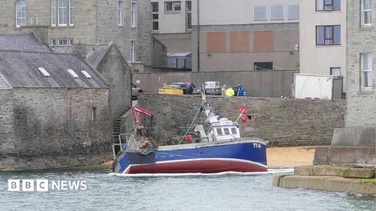 Fishing boat runs aground on Lerwick beach