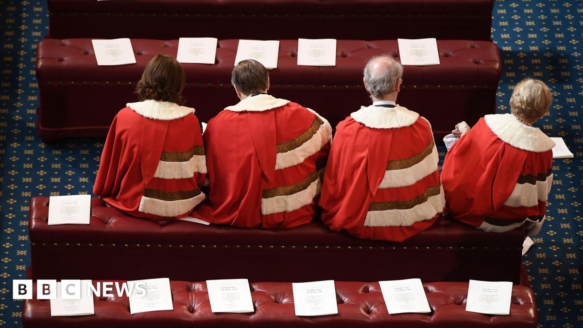 Peers find their places in the House of Lords before the State Opening Of Parliament at Houses of Parliament in 2017