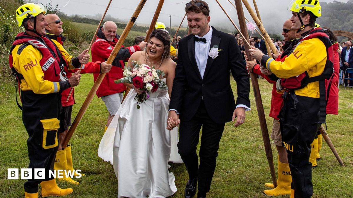 RNLI 'welly guard of honour' for newlyweds