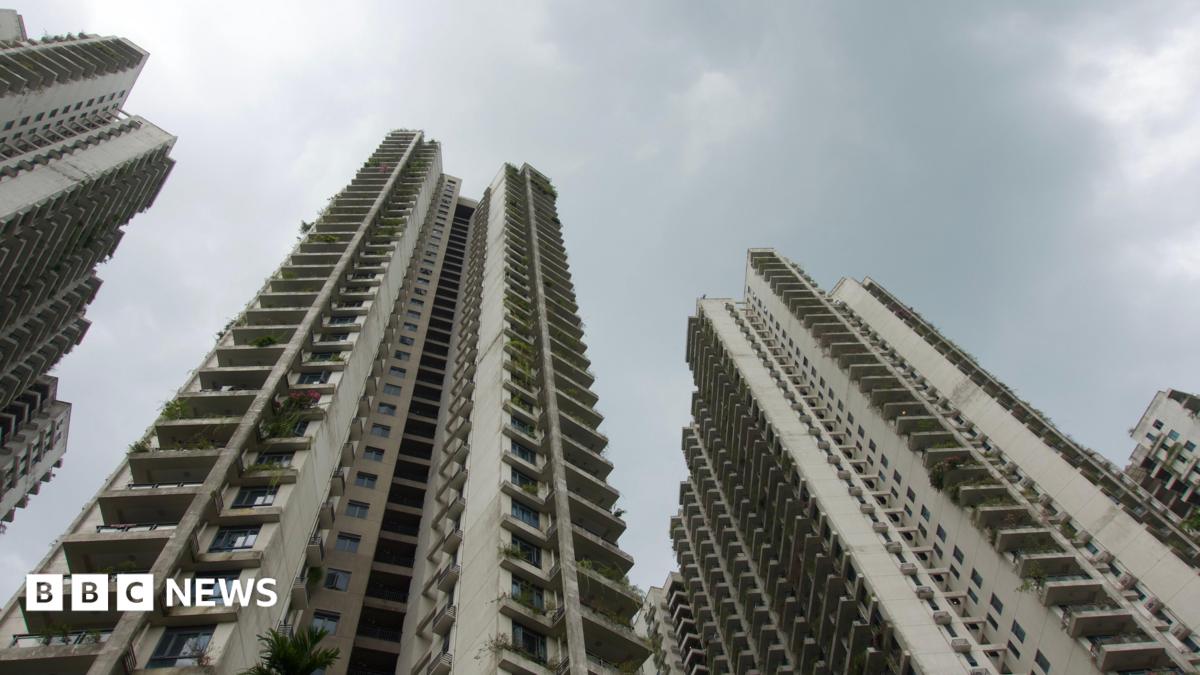 These seaside apartments were a ghost city - then police say scammers moved in