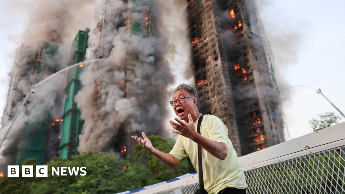 
                            Hong Kong residents react as deadly fire tears through housing estate