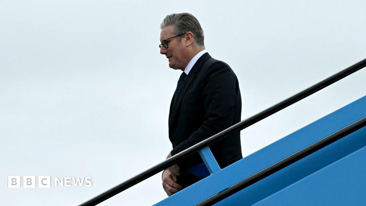 Sir Keir Starmer gets off a plane in Amsterdam, ahead of a Nato summit