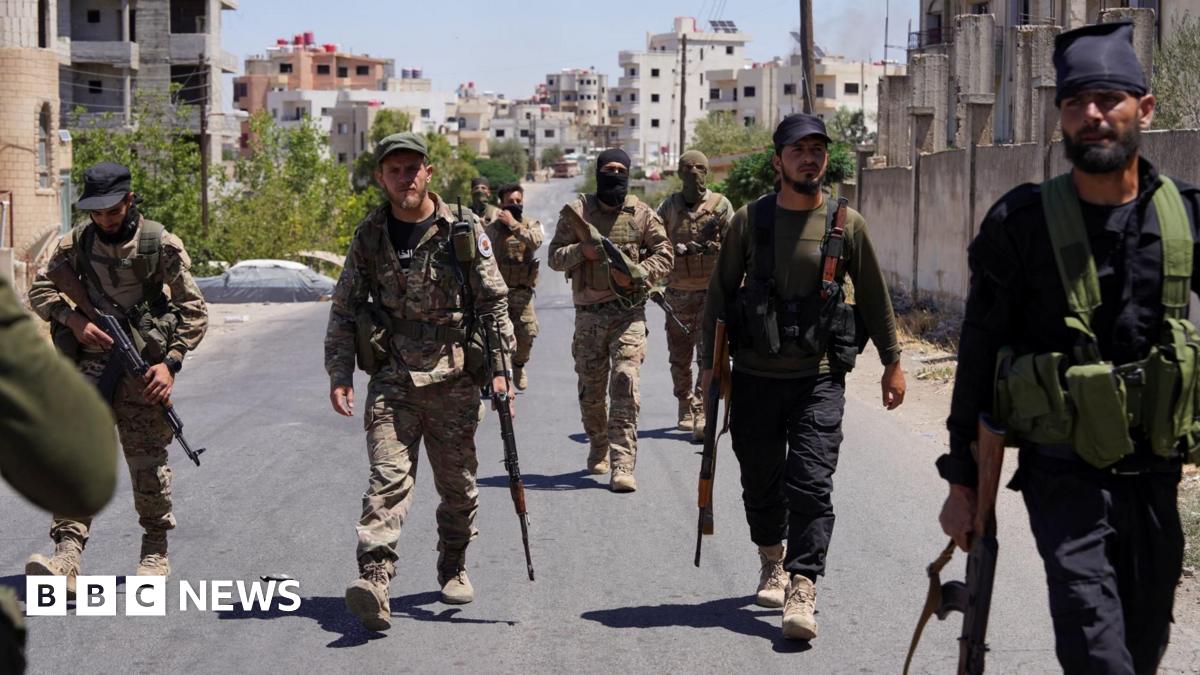 Syrian security forces patrol the southern city of Suweida on 17 July 2025