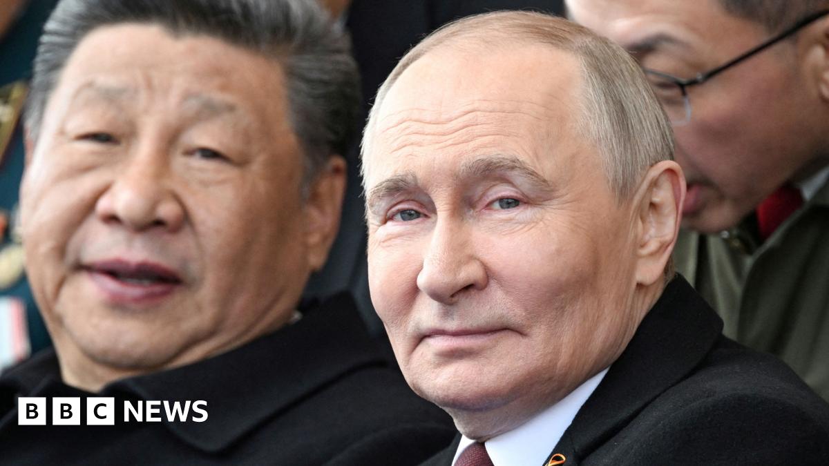 China: Xi Jinping arrives for military parade flanked by Putin and Kim