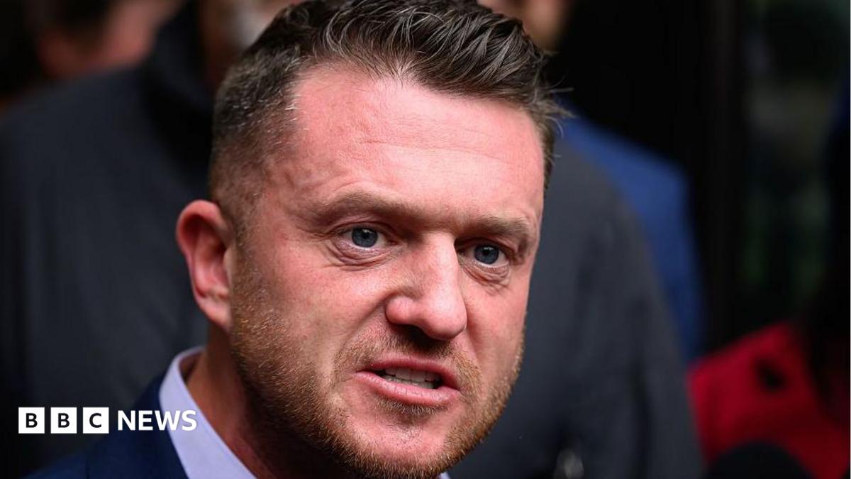 Tommy Robinson says he was stopped at Heathrow by police