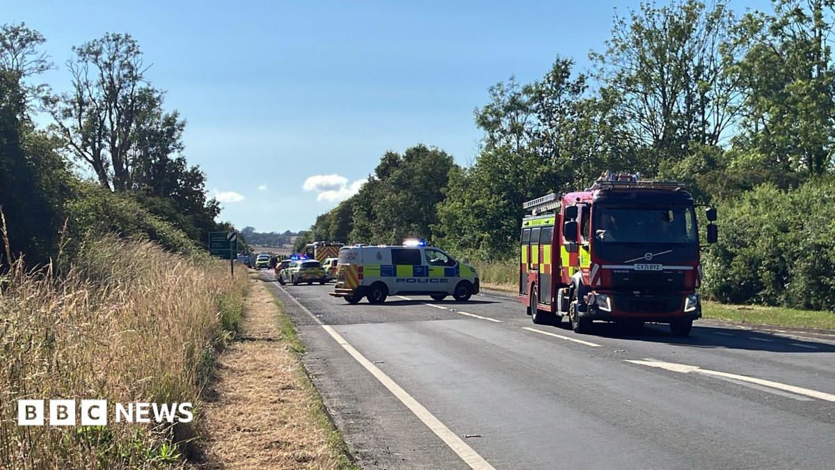 Man dies and two injured in crash between coach and van