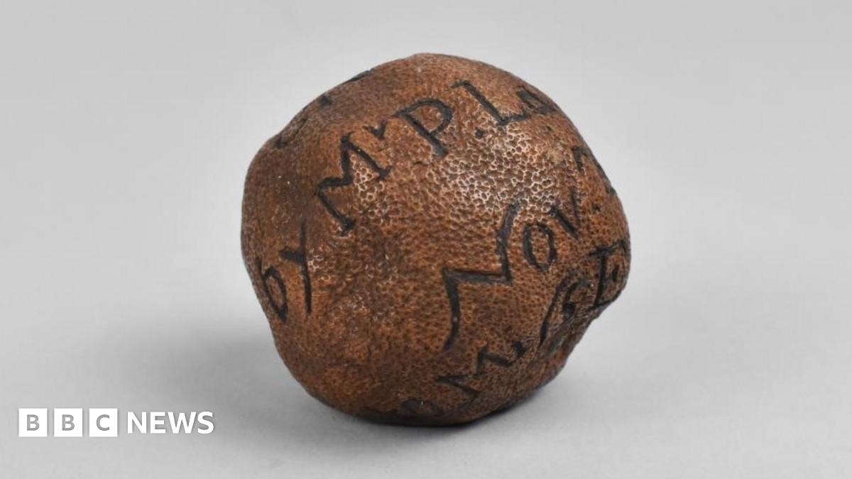 Newport zesty bidding war sees 285-year-old lemon fetch £1.4K - BBC News