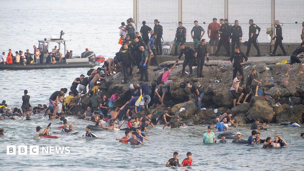 EU calls for strengthening borders after thousands of migrants pour into Spain from Morocco