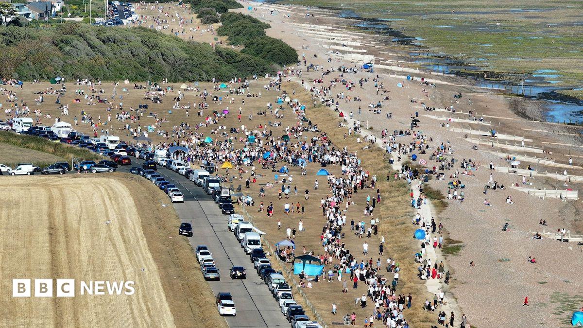 In pictures: South East sky watchers gather for rare solar eclipse
