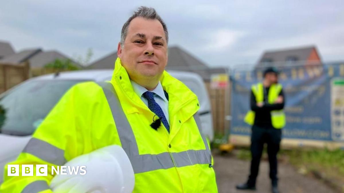 Gloucester man hires security to guard planning dispute wall