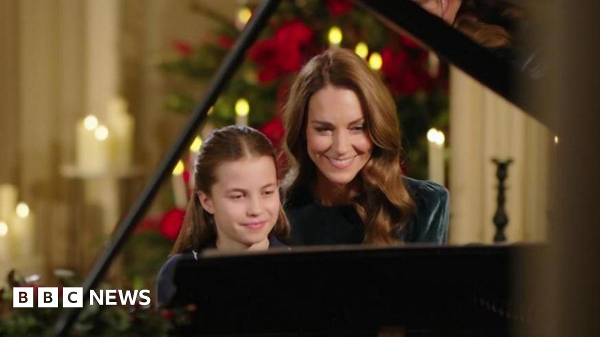 
                            Catherine and Charlotte perform Christmas carol service piano duet