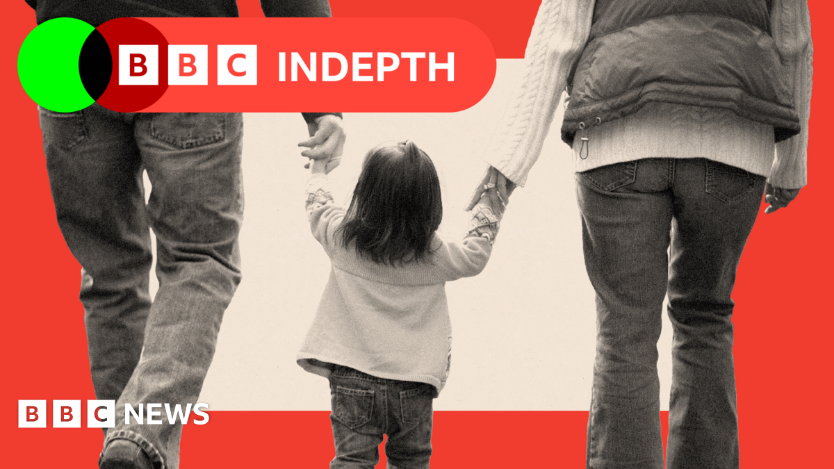 Treated image of a family of three walking together, holding hands with child in the middle