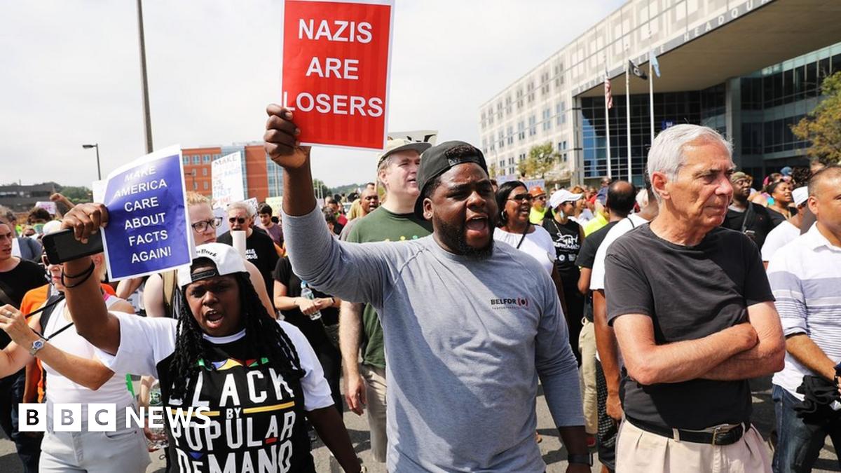 Boston march against right-wing rally draws thousands - BBC News