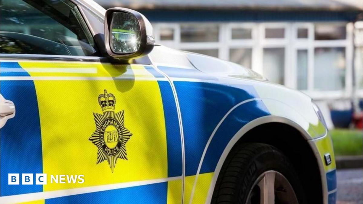 Arrest after car hits traffic lights and overturns in Nottingham
