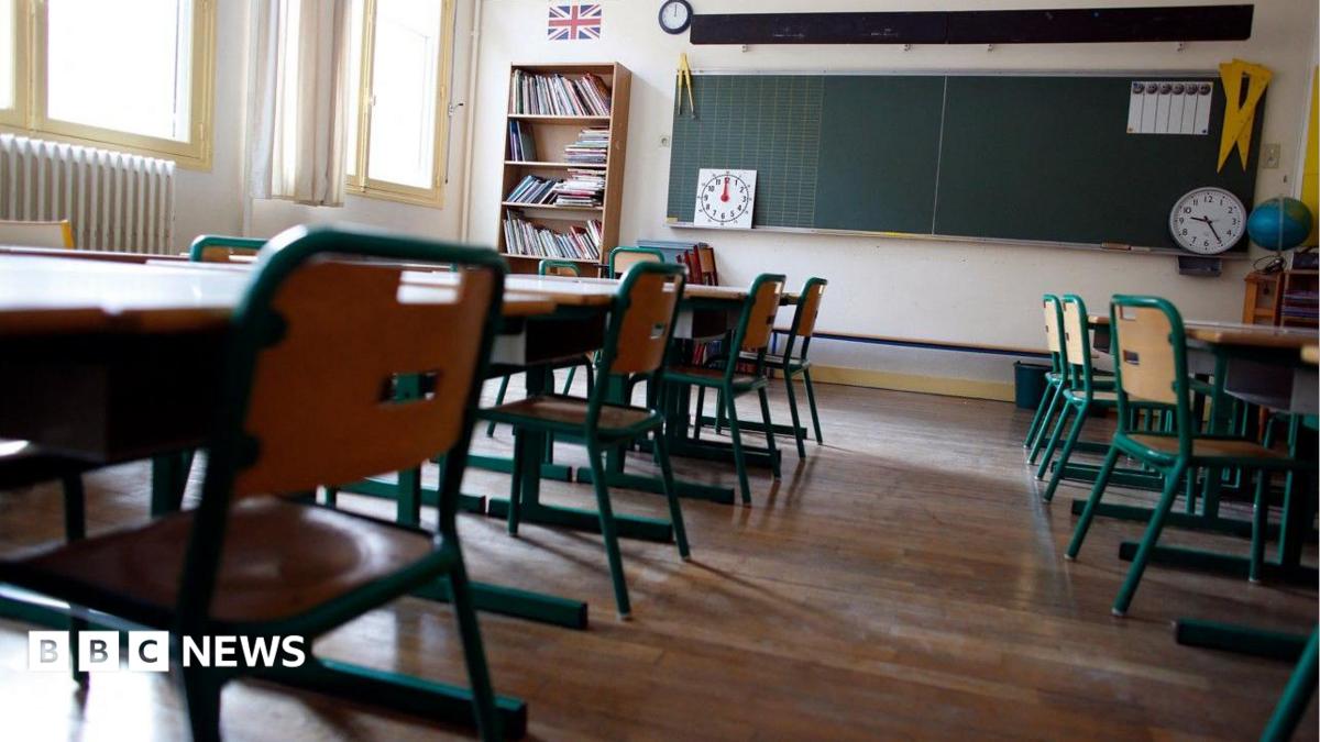 'Slurring' teacher who smelled of alcohol banned