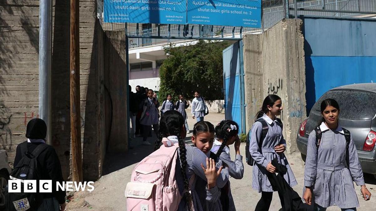 Palestinian schoolgirls leave an Unrwa school in Shuafat refugee camp in Israeli-annexed East Jerusalem (8 May 2025)