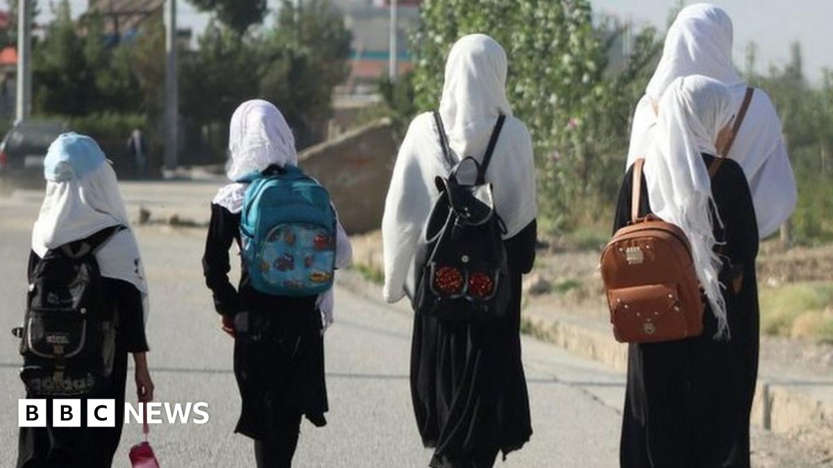 Girls walk to their school along a road in Gardez, Paktia porvince, on September 8, 2022.