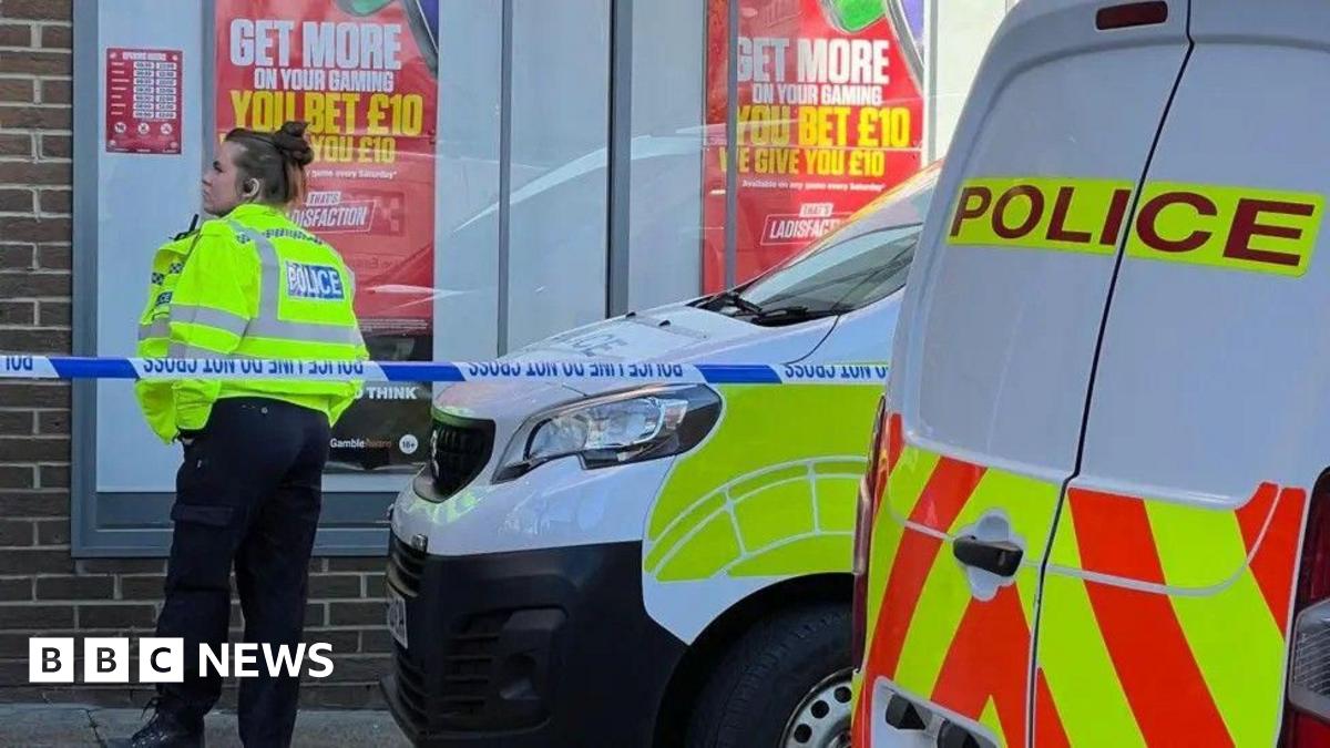 Dewsbury betting shop attack: pair charged with attempted murder