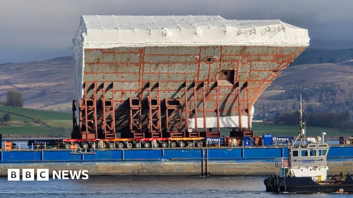 Bow section of latest Type 26 frigate sails up the Clyde   www.bbc.co.uk