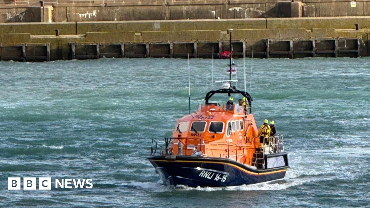 Pair in dingy saved after washing into Brighton Marina wall