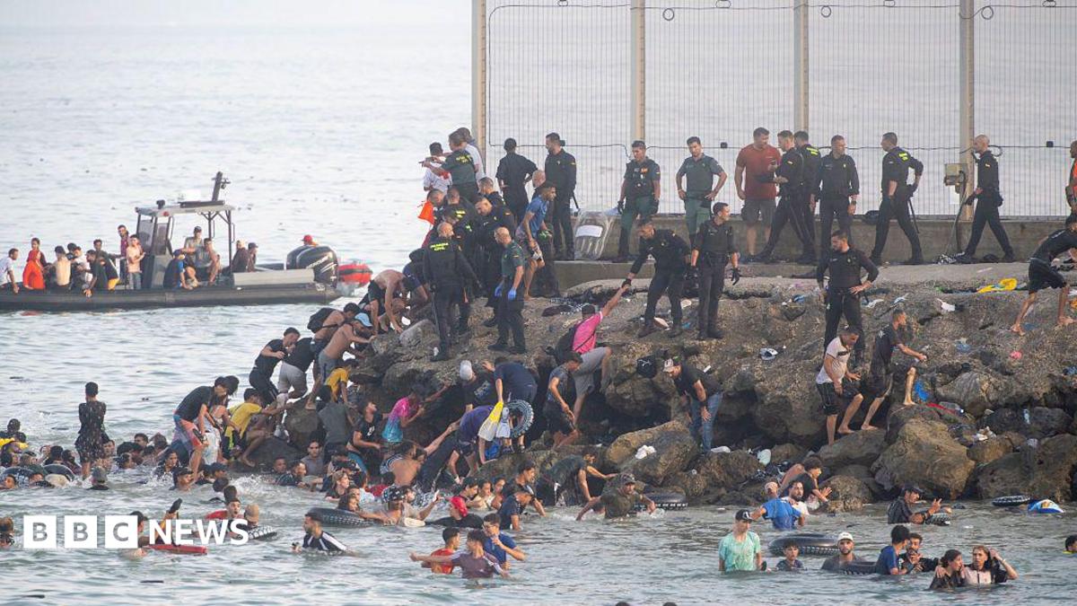 About 60,000 migrants arrive in Ceuta in 24 hours, Spanish territory's leader says