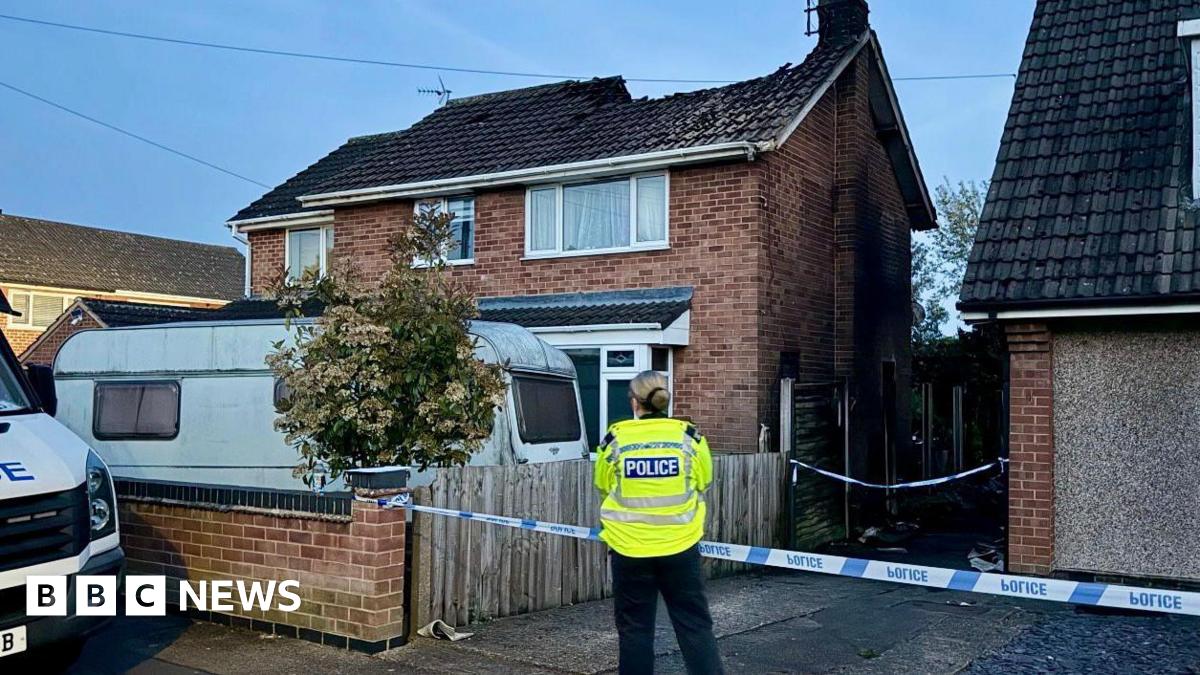 Fire service and police investigate blaze at Leicestershire house