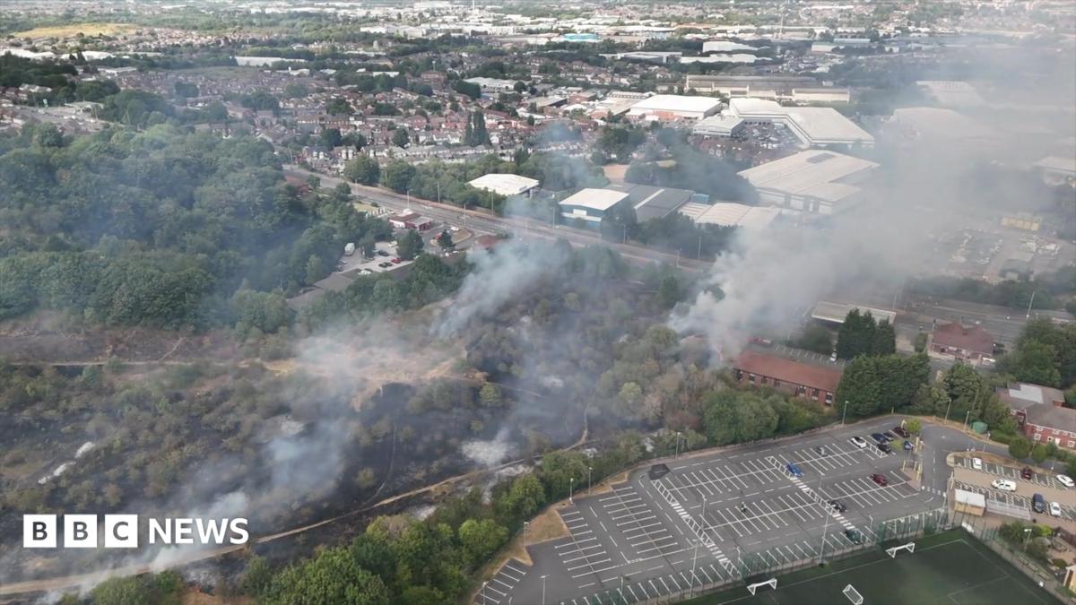 Oldbury road shut as 30 firefighters tackle grassland blaze