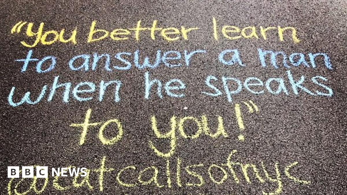 A catcall reading: "You better learn to answer a man when he speaks to you" written on the ground