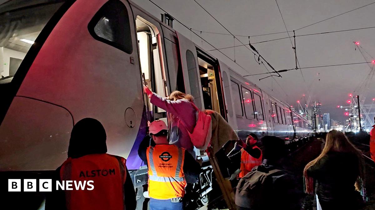 Rail passengers stuck for hours in 'surreal' ordeal - BBC News