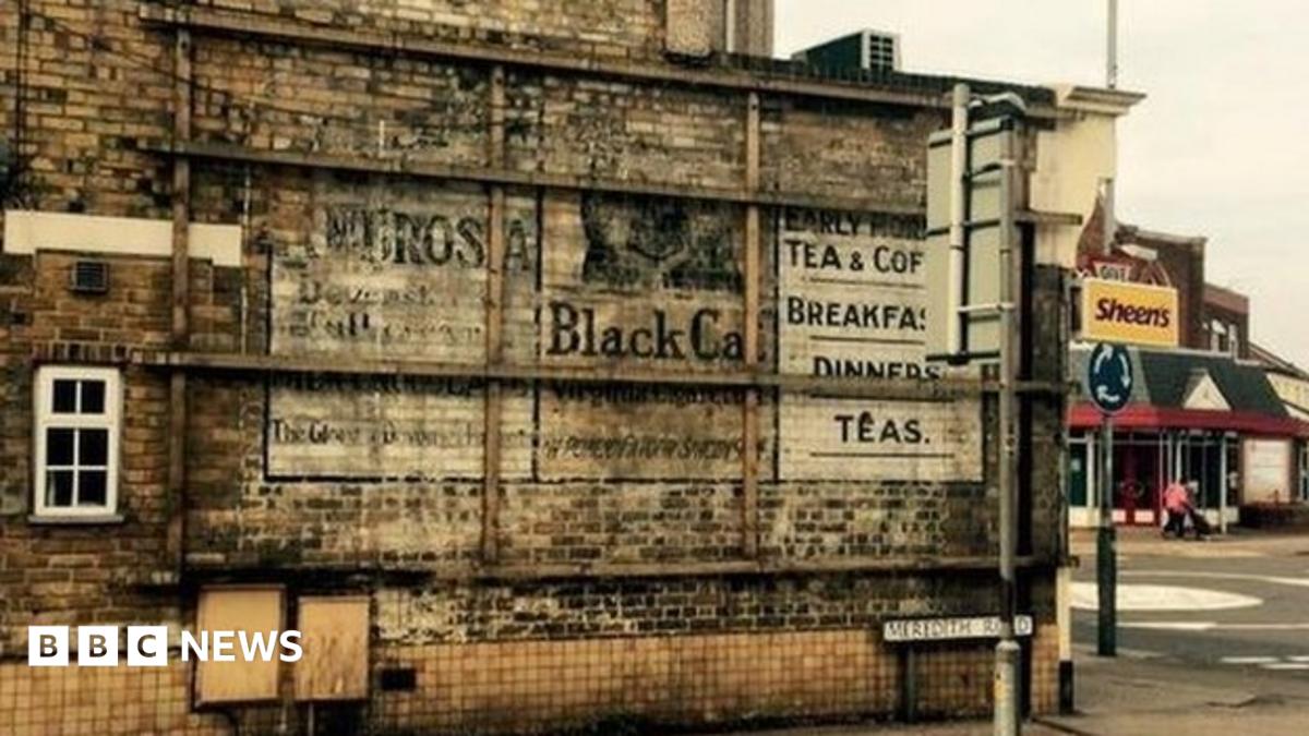 Clacton's hidden '1920s' billboards 'should be preserved' - BBC News