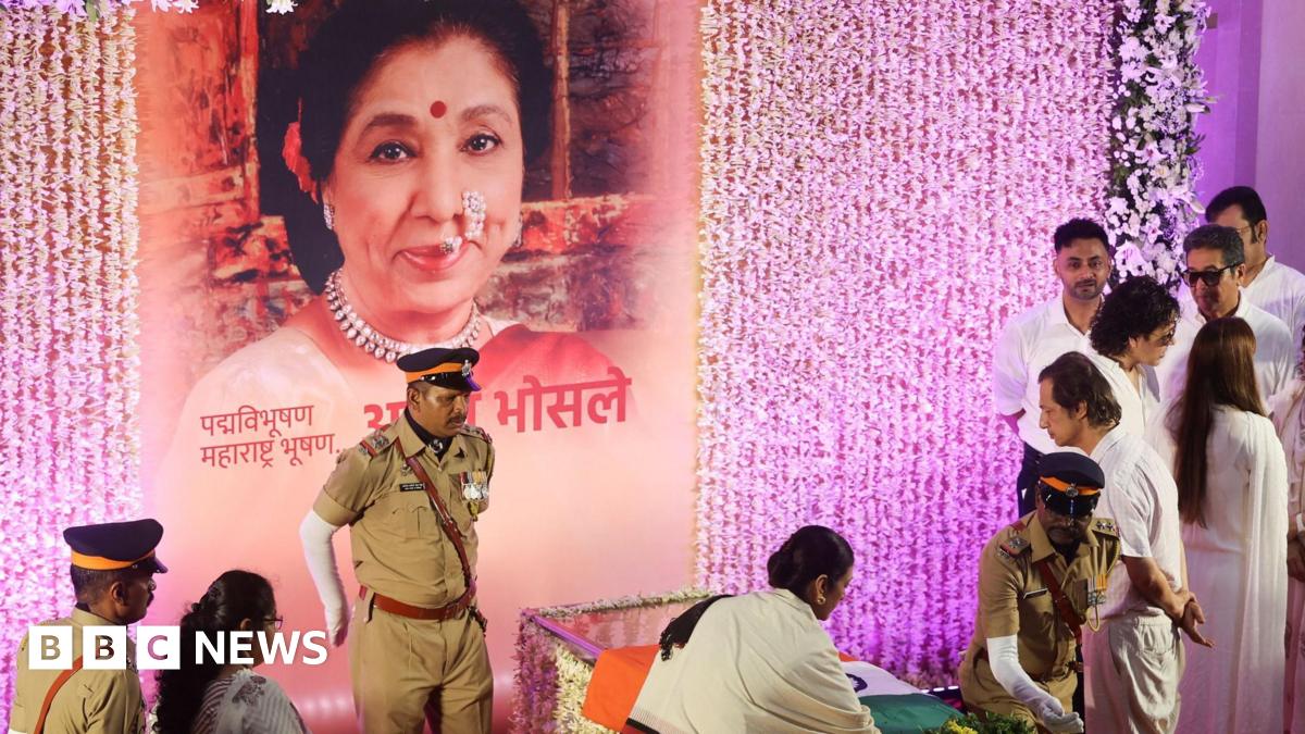 Asha Bhosle: Mourners sing iconic Indian star’s hit at cremation