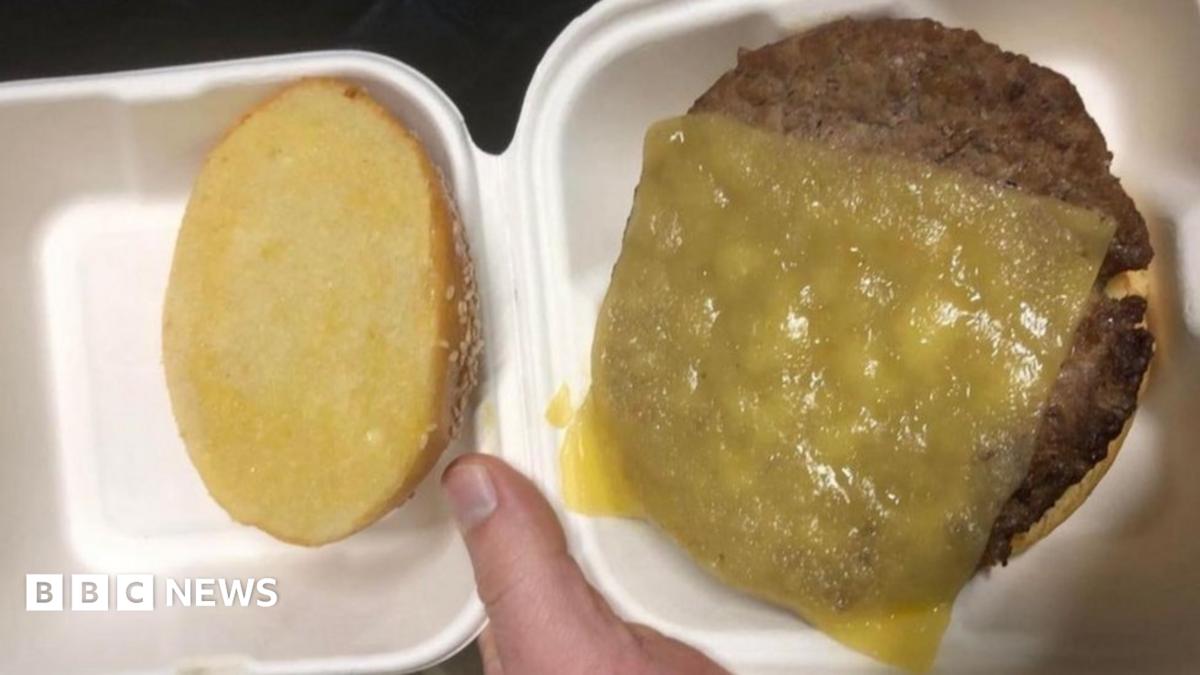 Oxford United seller stops burger sales in stadium after pic - BBC