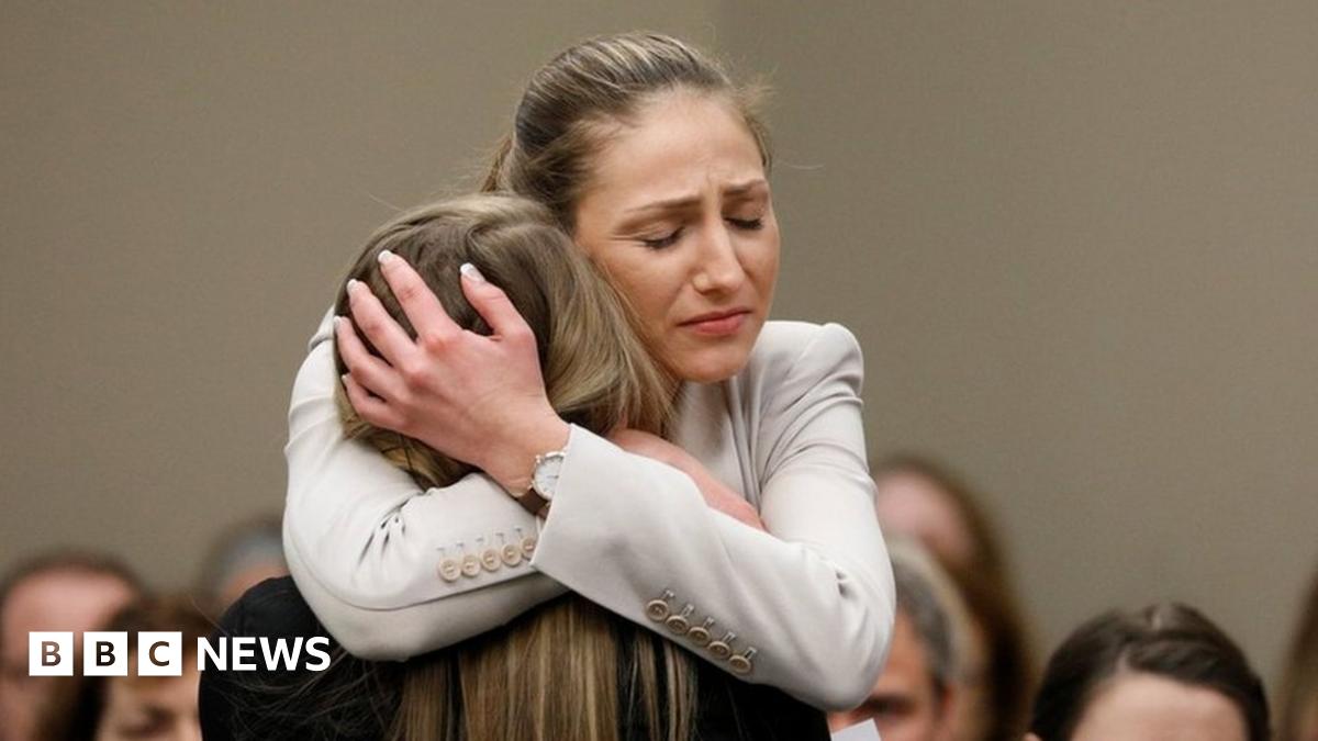 Victim Emily Morales is hugged after speaking at the sentencing hearing for Larry Nassar - 23 January 2018
