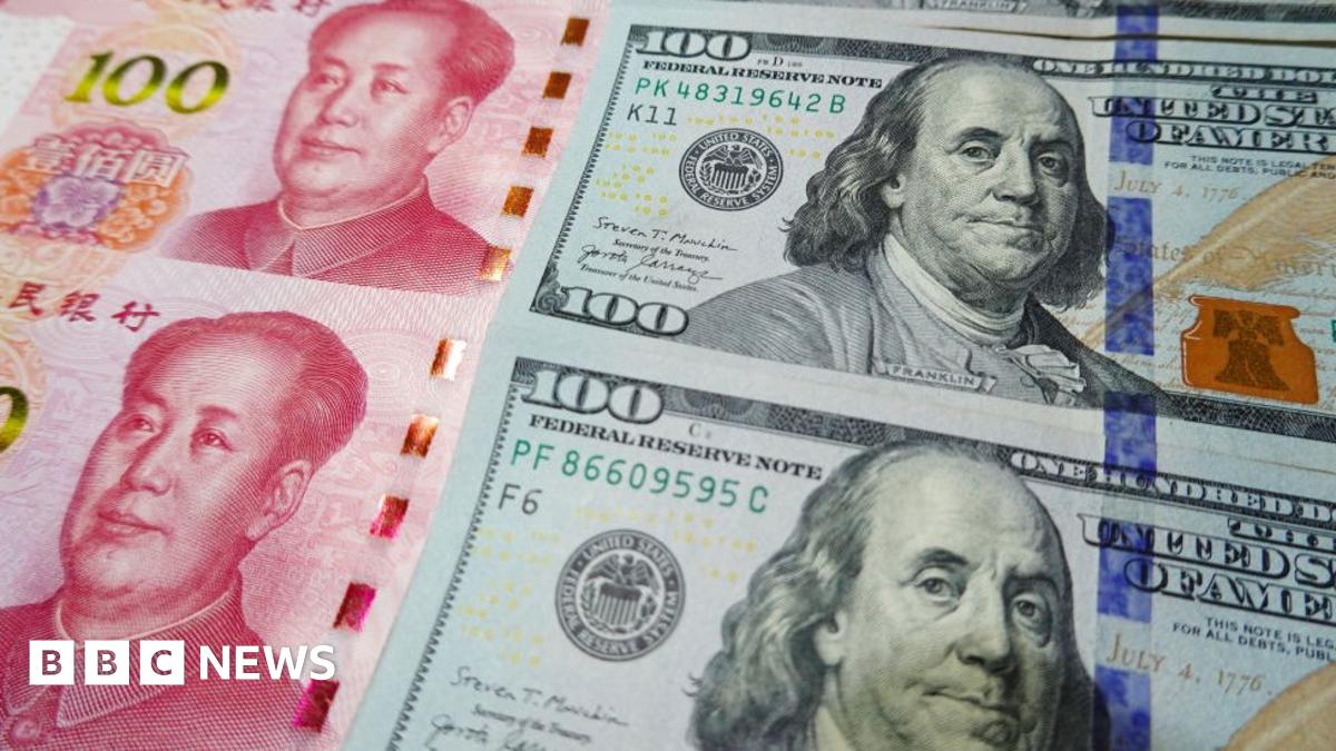 Chinese yuan: Currency hits record lows against US dollar - BBC News