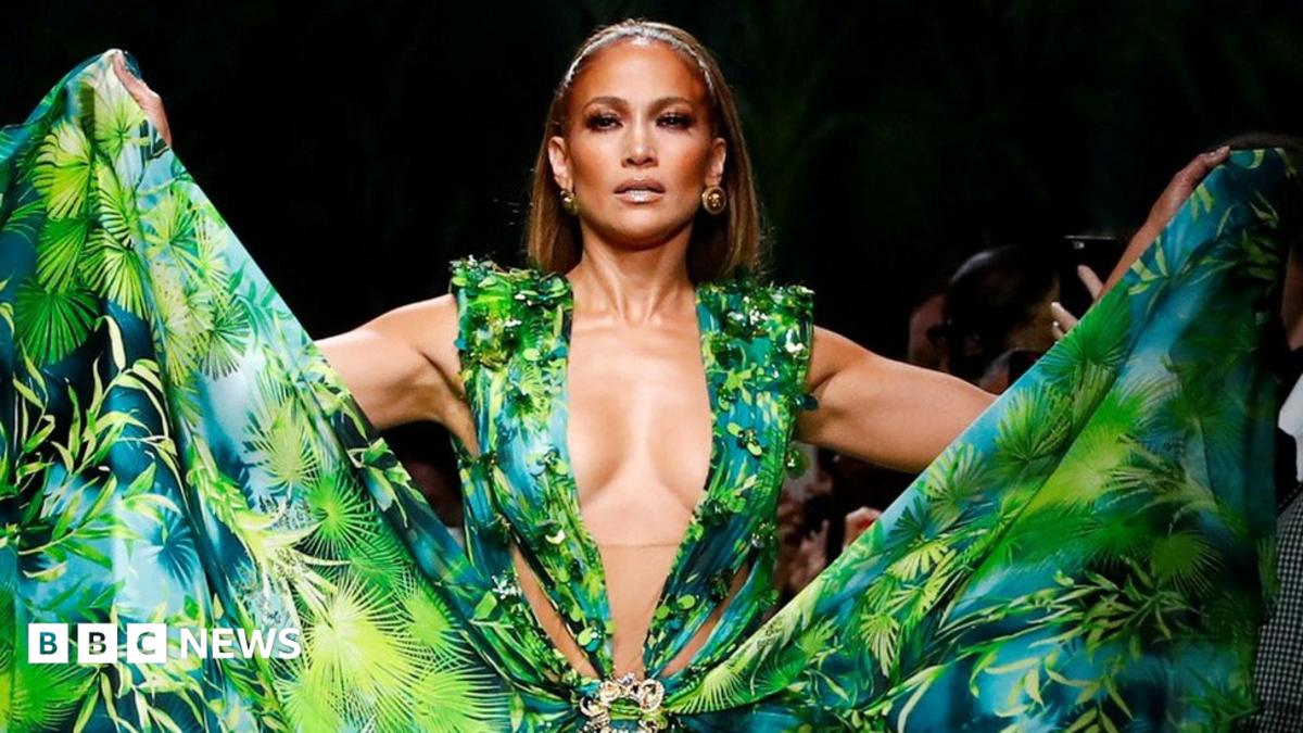 j lo green dress google images jennifer lopez's dress creating google images (2001) in 2000, j. lo wore the green jungle versace dress (a last minute outfit choice) to the grammy awards, and changed the internet forever. throughout