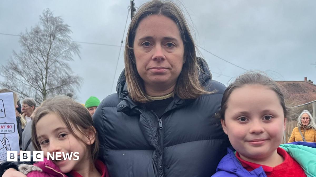 Parents join protest at Reepham High School over proposed cuts - BBC News