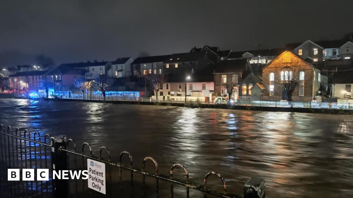 Wales floods: Heavy rain causes flooding and travel disruption