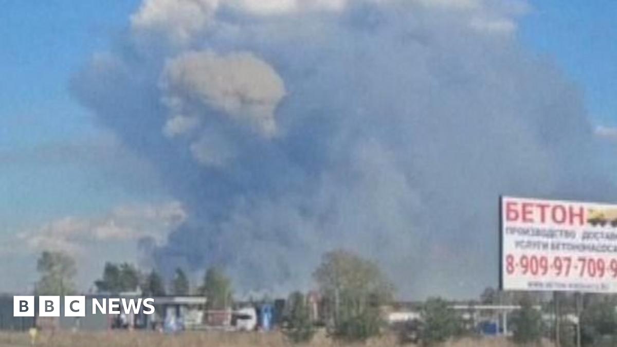 Smoke rises from ammunition depot