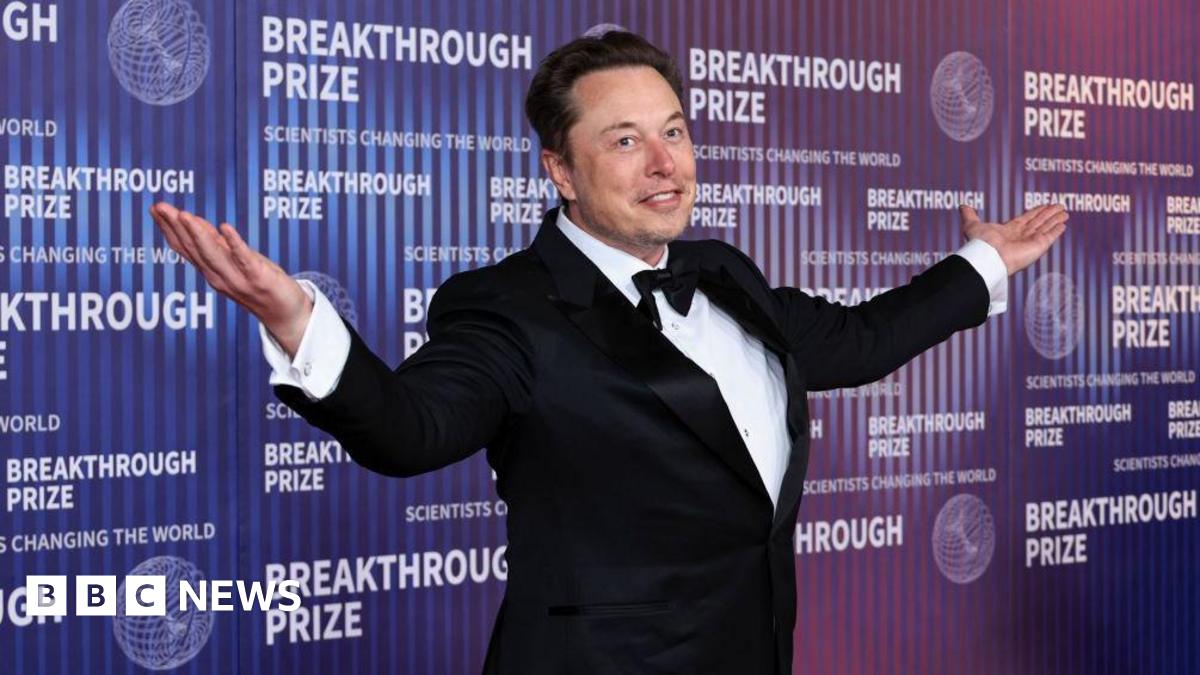 Tesla awards boss Elon Musk bn in shares