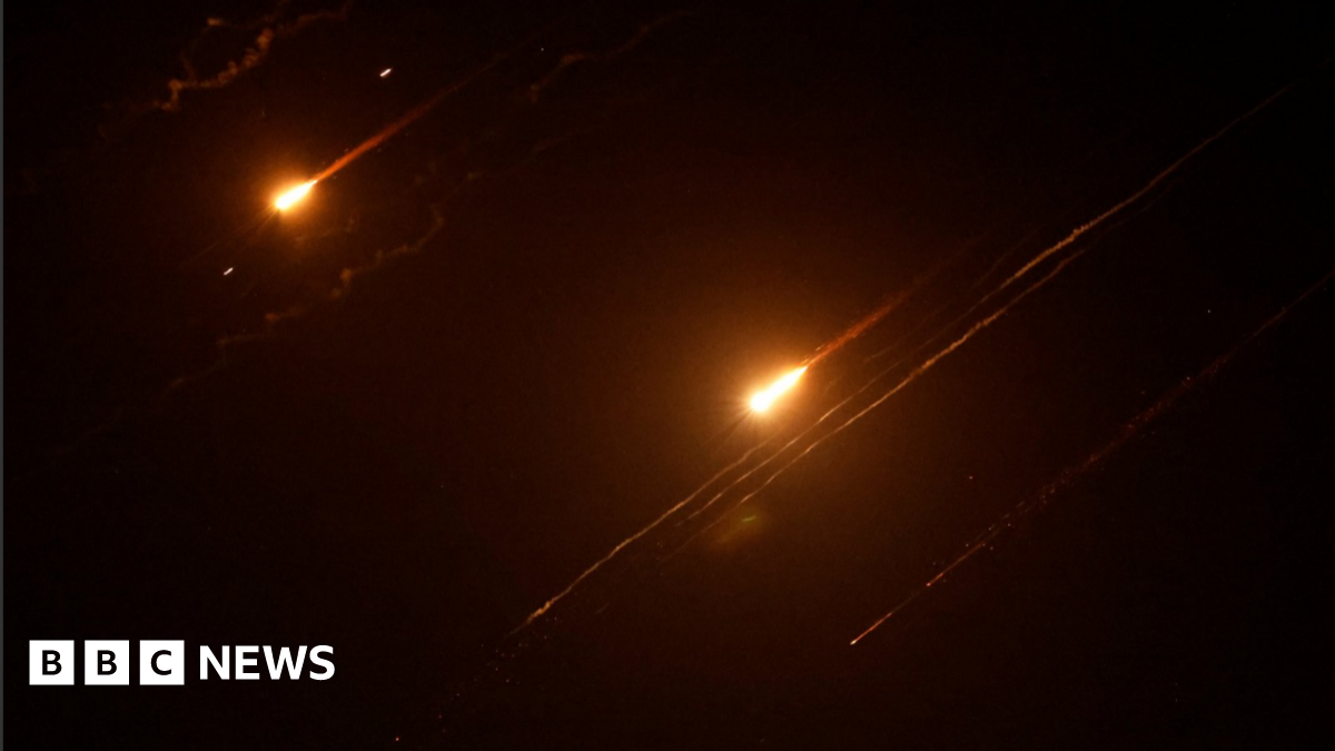 Israel and Iran launch simultaneous attacks as conflict intensifies