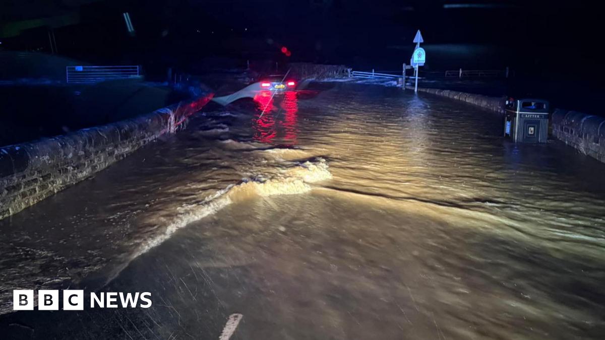 Travel chaos as heavy rain batters North West