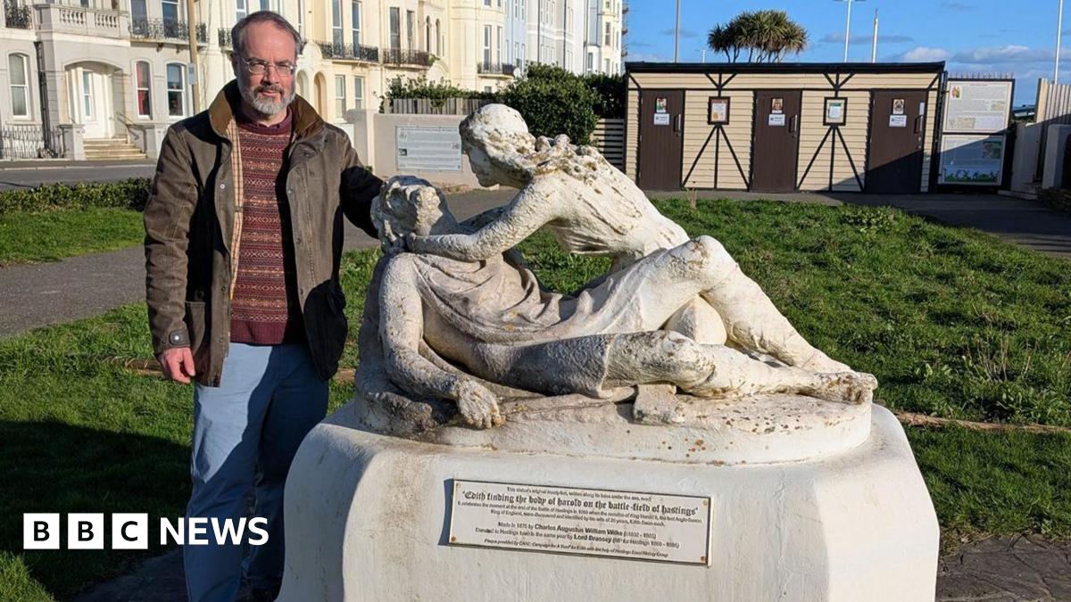 Prof Tom Licence is standing near the statue of Harold and Edith at West Marine Gardens. The sculpture shows Edith Swanneck finding the body of her husband, King Harold Godwinson, on the field of the Battle of Hastings in 1066, and stands a few miles f...