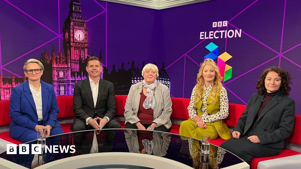 Five candidates for the Gorton and Denton By-election in the North West Tonight studio with its BBC election backdrop and the Houses of Parliament.
From left: Charlotte Cadden (Conservative) has short blonde hair, black glasses, a white top and bright...