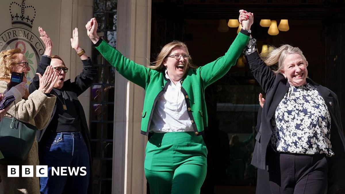 Following the ruling in the Supreme Court that the term woman refers to 'biological women', campaigners Susan Smith (in green suit) and Marion Calder, both directors of 'For Women Scotland' celebrate the judgement outside the court, on 16th April 2025,...