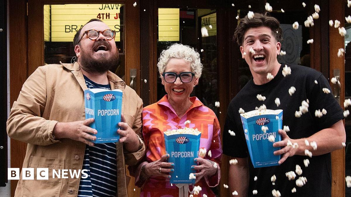 the presenters of the programme with popcorn