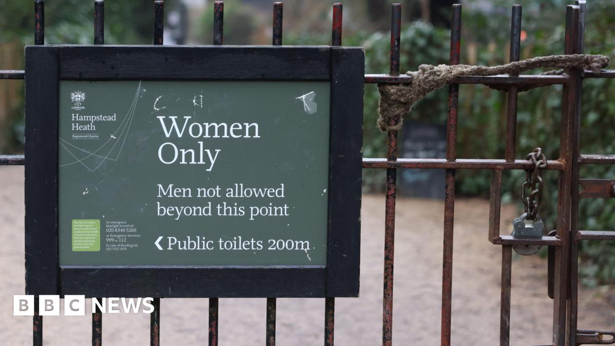 A sign indicating the 'Women Only, Men not allowed beyond this point' is seen attached to gates 