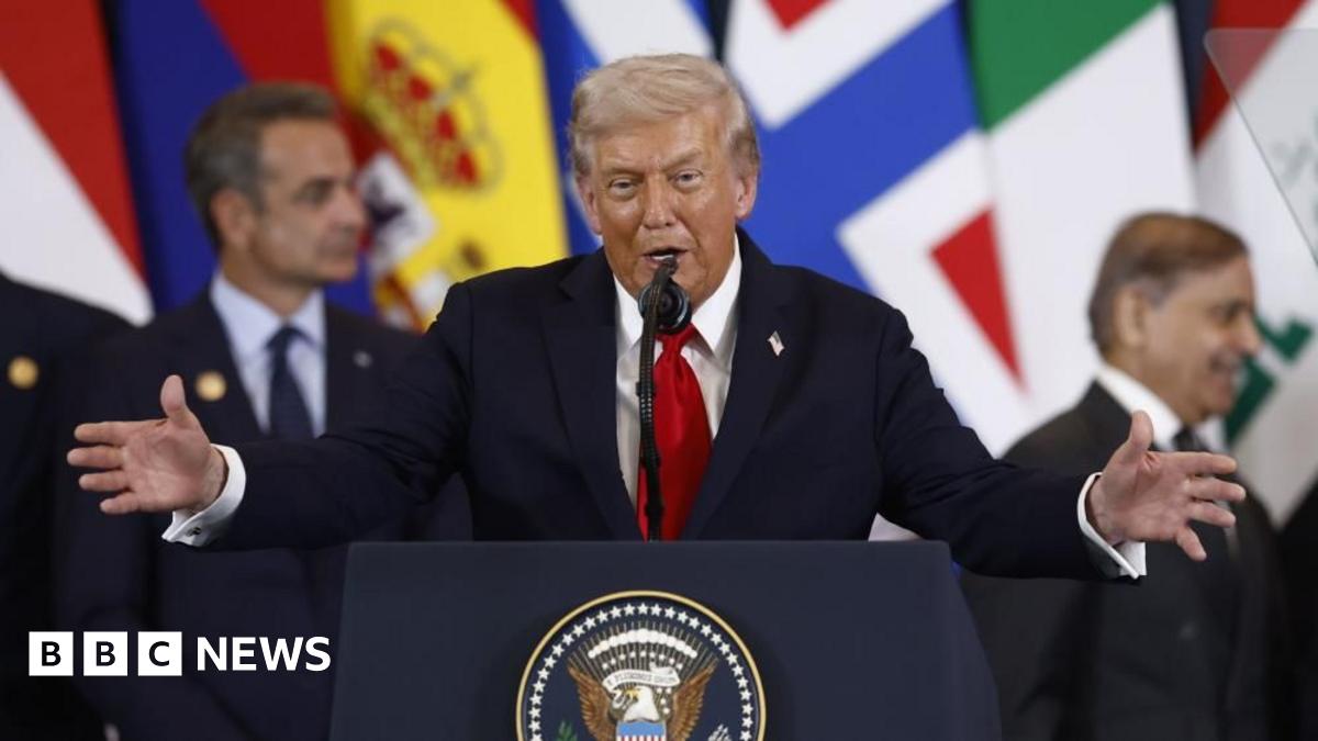 US President Donald Trump, standing at podium, delivering a speech at a summit in Sharm El-Sheikh, Egypt. 
