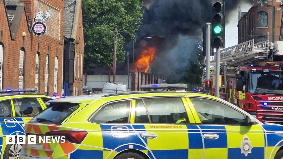 Properties evacuated as large fire breaks out at scrapyard
